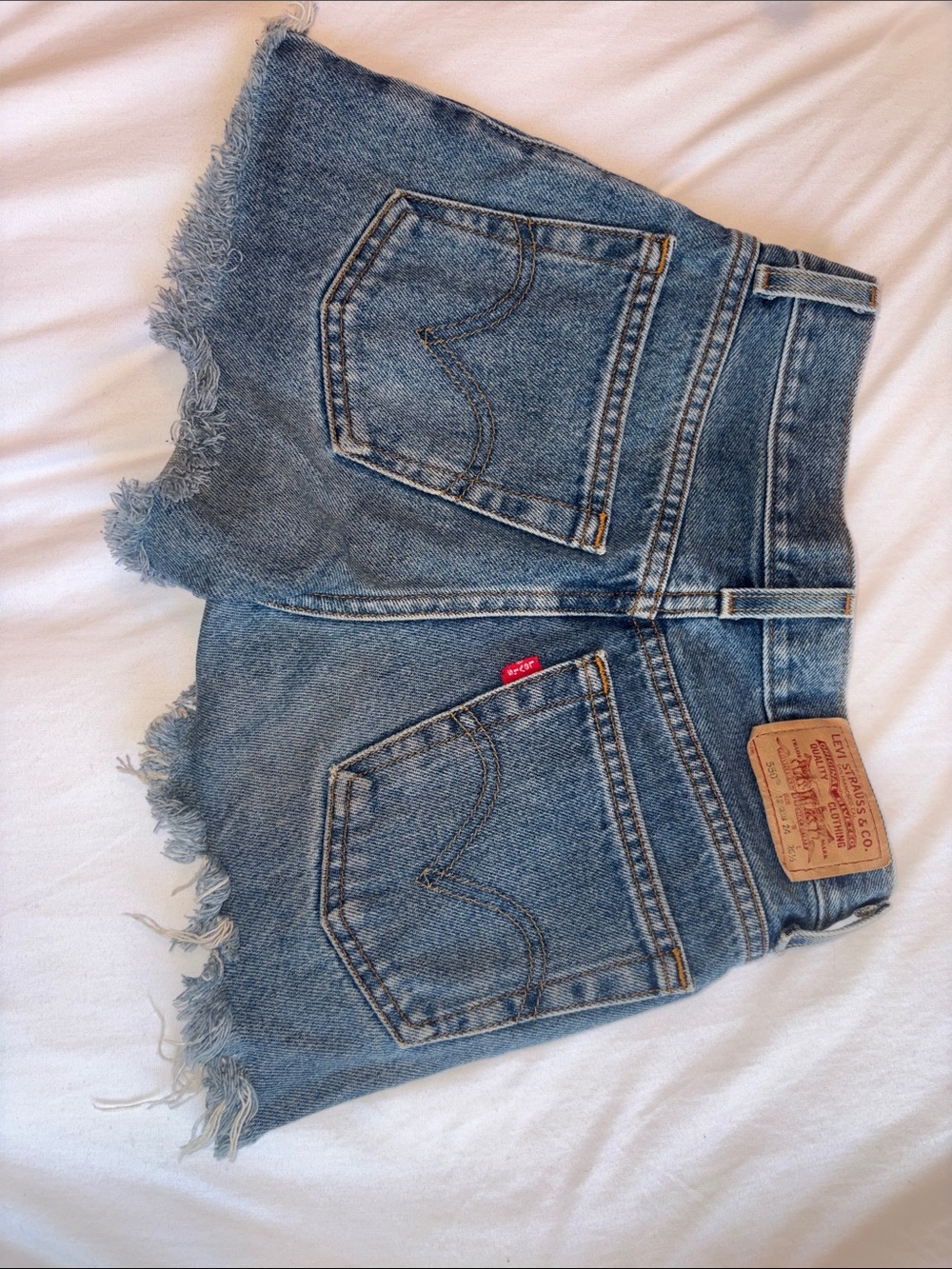 Levi's Frayed Hem Denim Cutoff Shorts in Blue